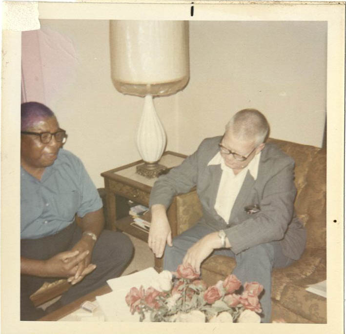 George Mallinson interviews musician Willie Humphrey (pictured seated at left) at Humphrey’s New Orleans home, on March 1, 1972, photographer: Jacqueline Mallinson, George G. and Jacqueline V. Mallinson collection, Hogan Archive of New Orleans Music and New Orleans Jazz, Tulane University Special Collections. 