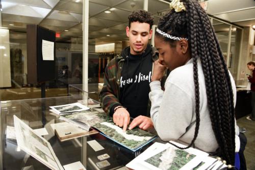 Students at a Latin American Library exhibit